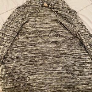 Women’s pullover with open back and a hood